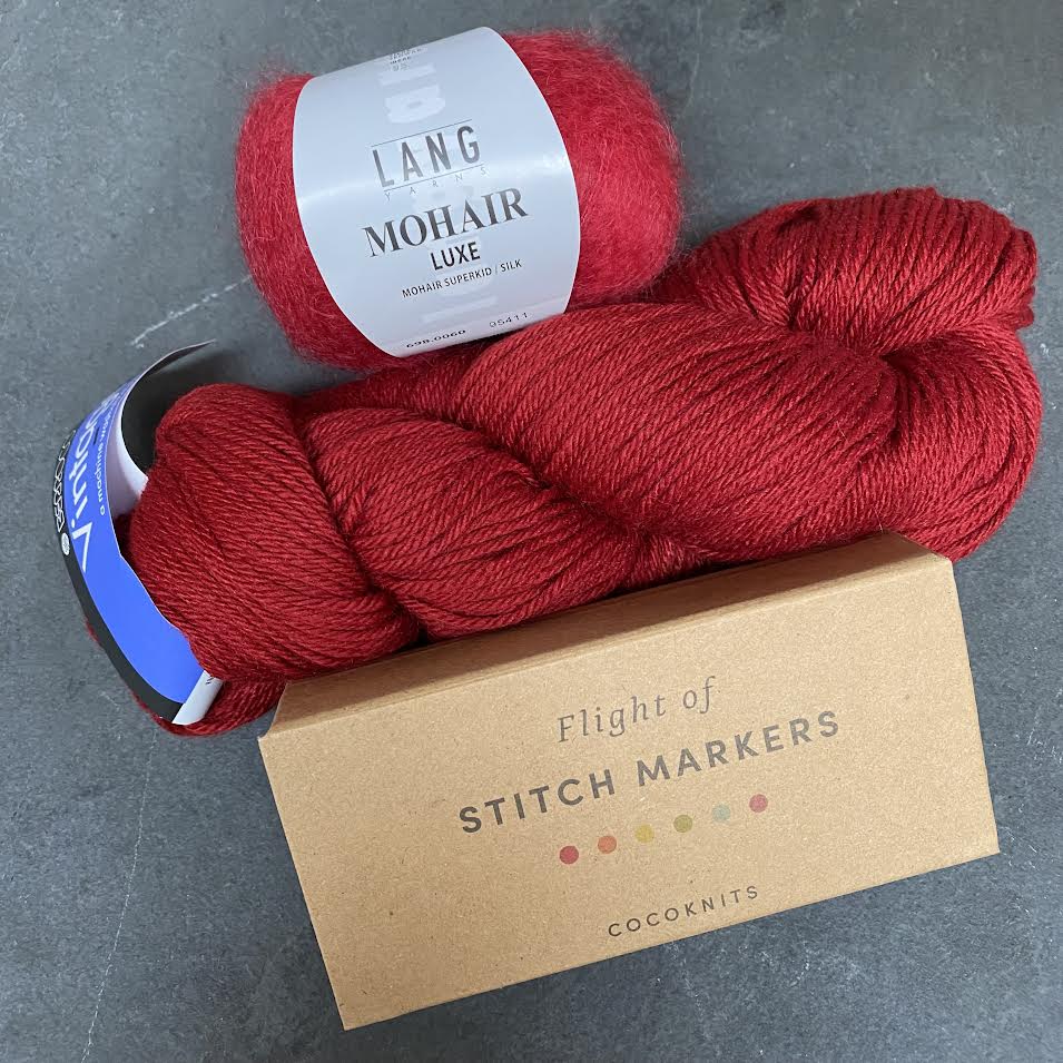 first flurry kit in red and a flight of stitch markers
